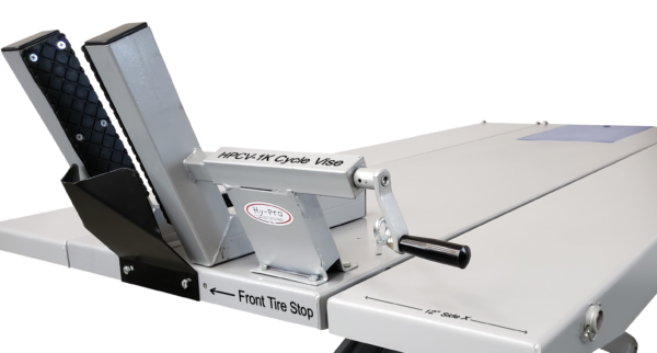 Hy-Pro SL-2484 motorcycle lift table with HPCV-1K cycle vise and front tire stop. Shows 12" side extension.