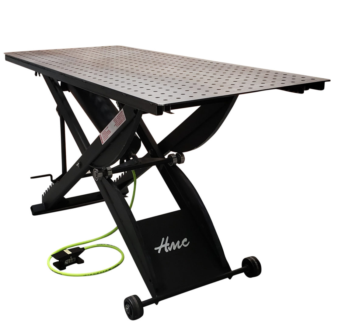 Adjustable height welding layout table