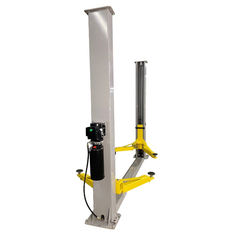Triumph 9,000 lb. floor plate car lift gray and yellow