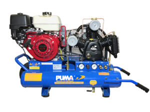 Puma wheelbarrow compressor with Honda engine. Two stage piston style pump.
